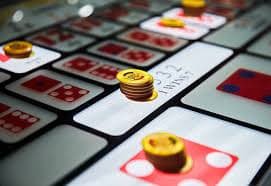 Antarmuka permainan Mega Wheel di aplikasi hoki 99 menampilkan roda putar besar dengan segmen warna-warni